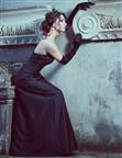 Elegant lady in classic dark gown